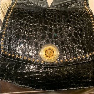 Vintage St Marten Black embossed leather handbag.